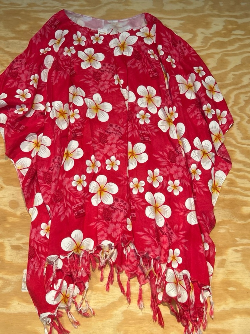 Red Floral Plumeria Fringe Kimono/coverup. Has arm holes. 100% Rayon